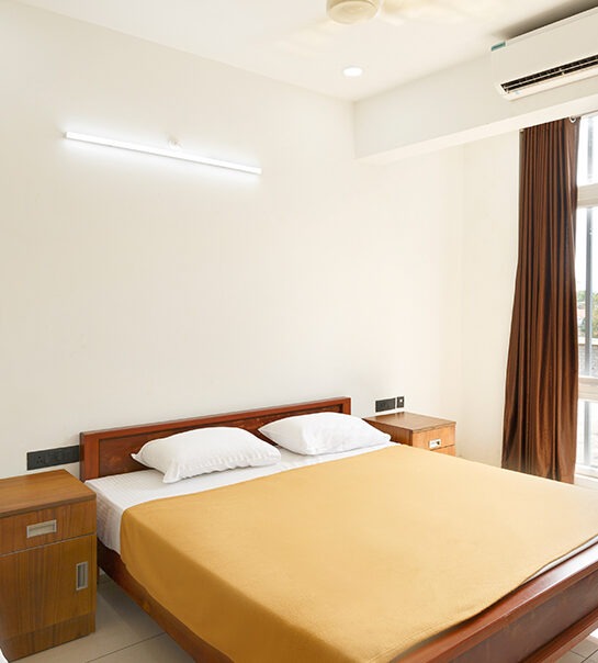 Standard room at Devi Royal Residency with modern amenities.